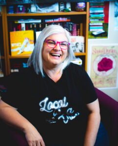 Dani Cutler laughing in her studio